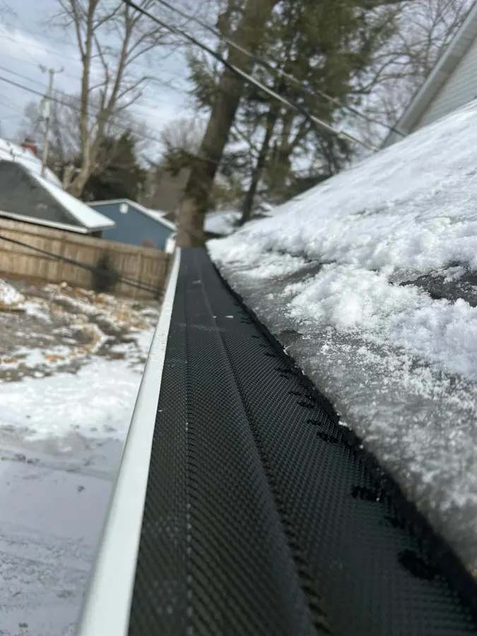 Micromesh gutter guard installed to block fine debris